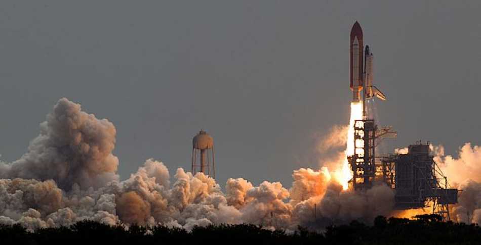 The Space Shuttle Atlantis launching from Cape Canaveral, Florida